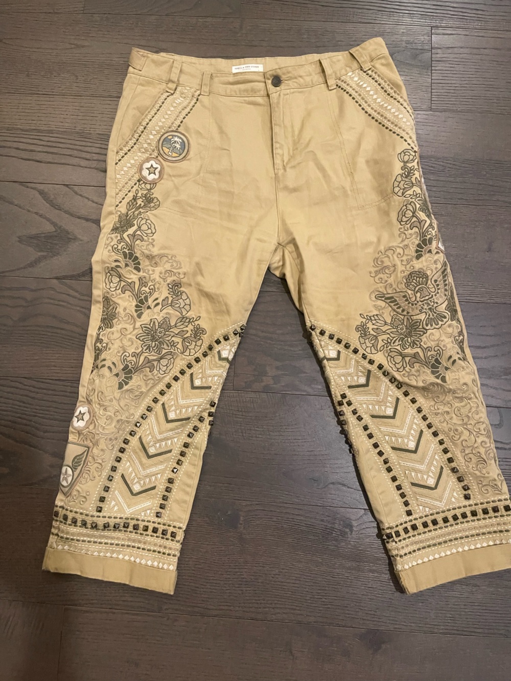 Spell and Gypsy  wanderer khaki cropped pants  with embroidery, patch & studs Lg
